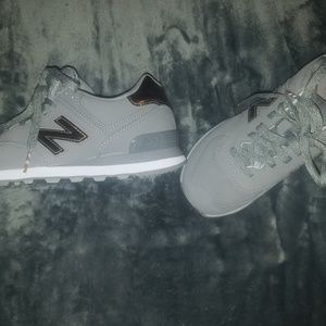 Never worn New Balance 574 rare bronze